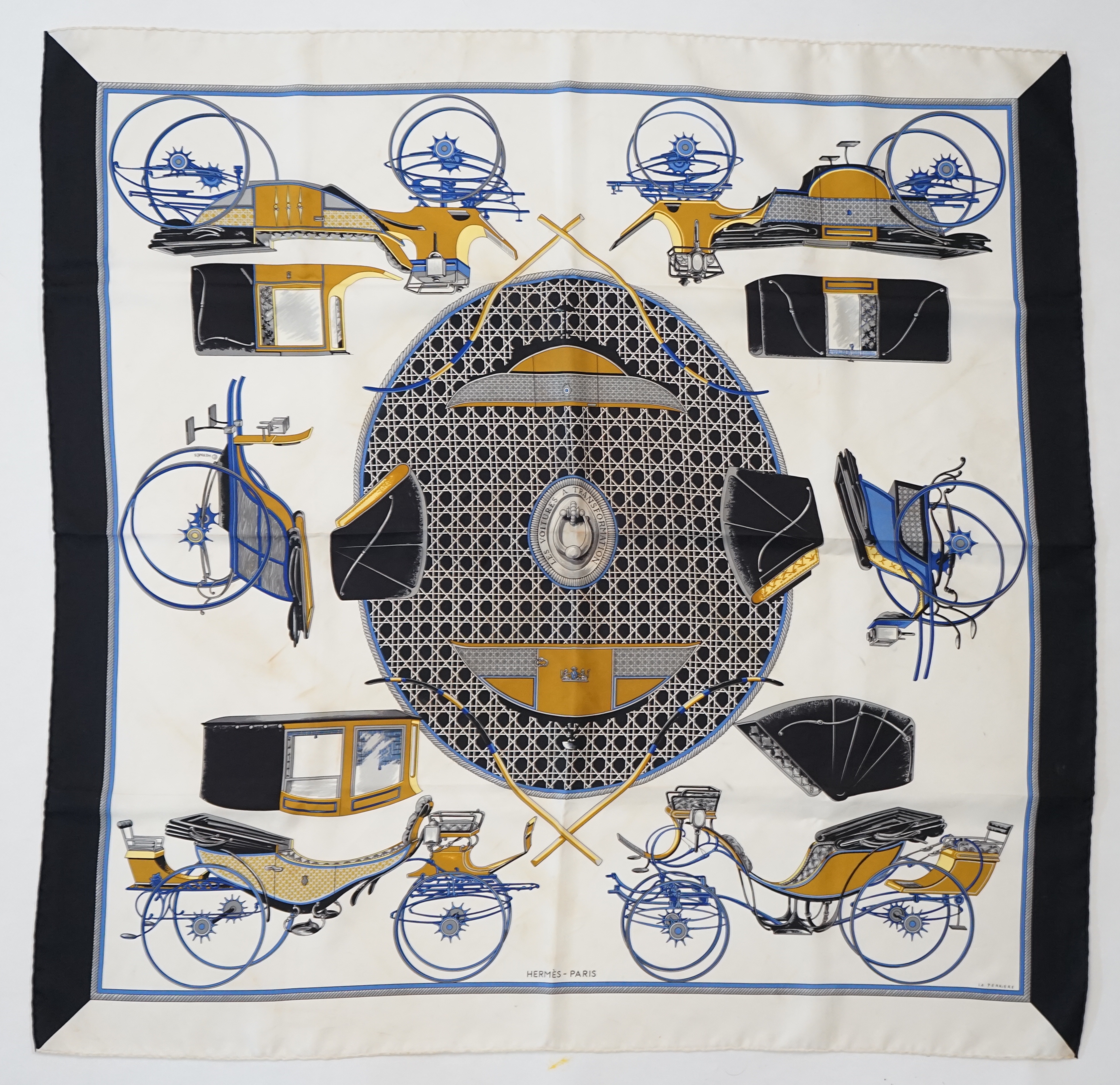 A Hermès Les Voitures a Transformation by Francoise de la Perriere black and white silk scarf, approx 90cm x 90cm
